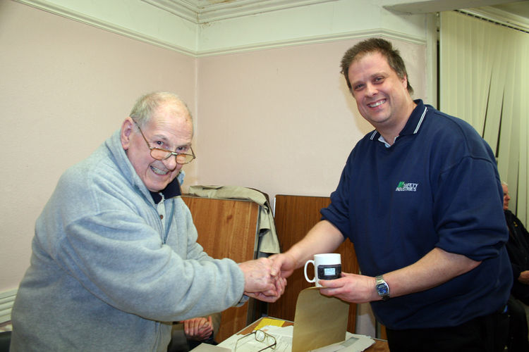 Graham 2E0GML receives the chairman's award for his contribution to the club over the years.
