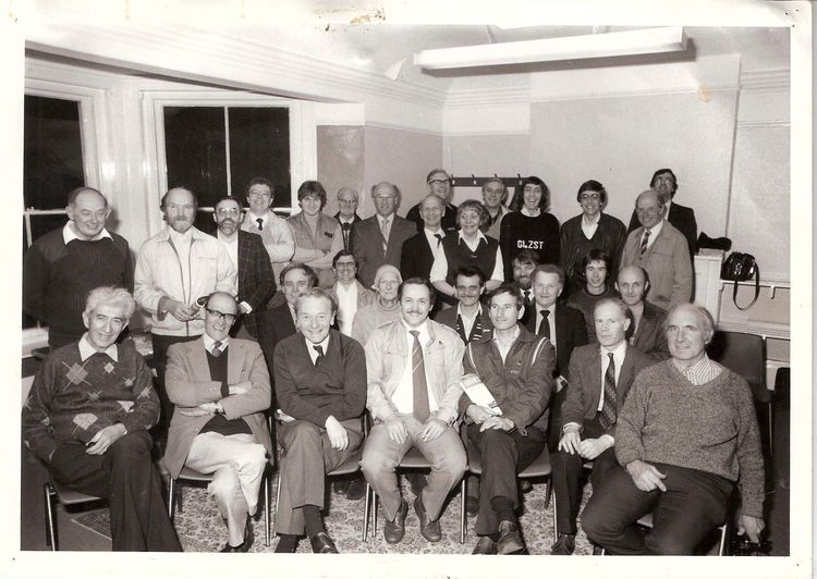 Taken at the club circa 1985
Who can you spot ! Thanks to Andy G4VIW for the picture, Andy can be spotted in the back row 4th from the left.
Back row (working from left) first Eddie Skinner, 4th Andy G4VIW, Dave G4ZST in the jumper. 
Middle row sitting down (working from the left) 2nd Bill G0BOF.
Front row (working from the left) 6th Derek G3OBX
Keywords: g0bof g3obx g4viw