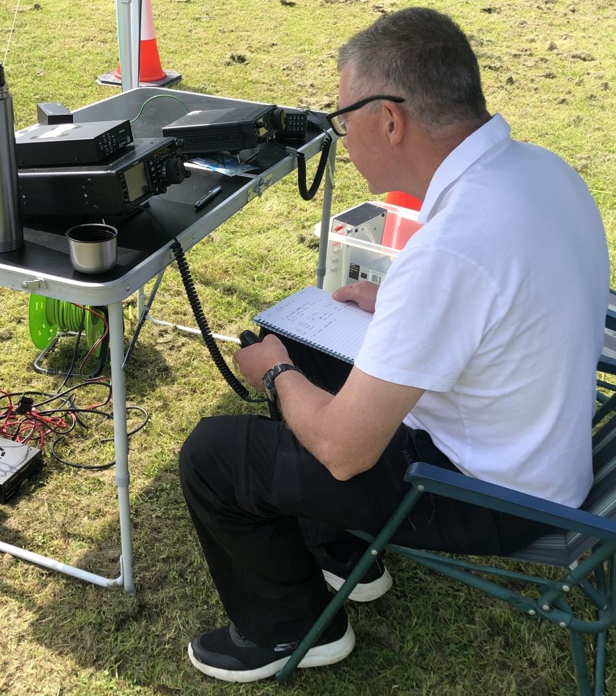 Kevin 2E0WKV operating the radio and logging contacts made

